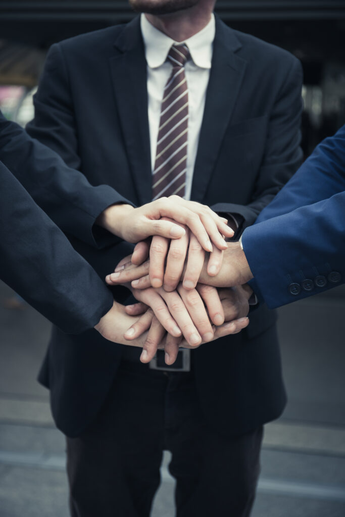 Group of Business Partners Team with hands together