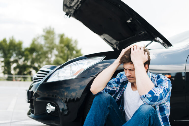 Man having a car problem